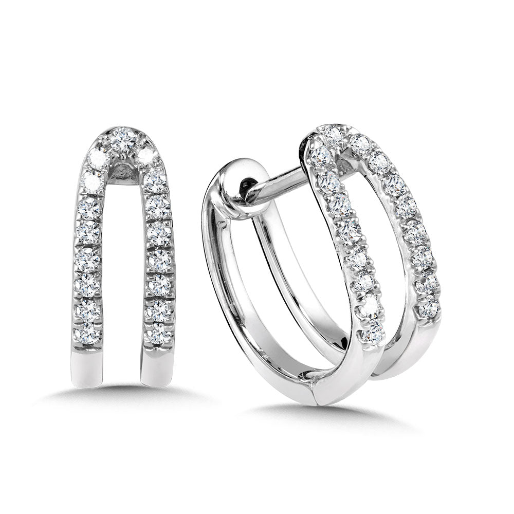 Huggie earrings with round diamonds in white gold.