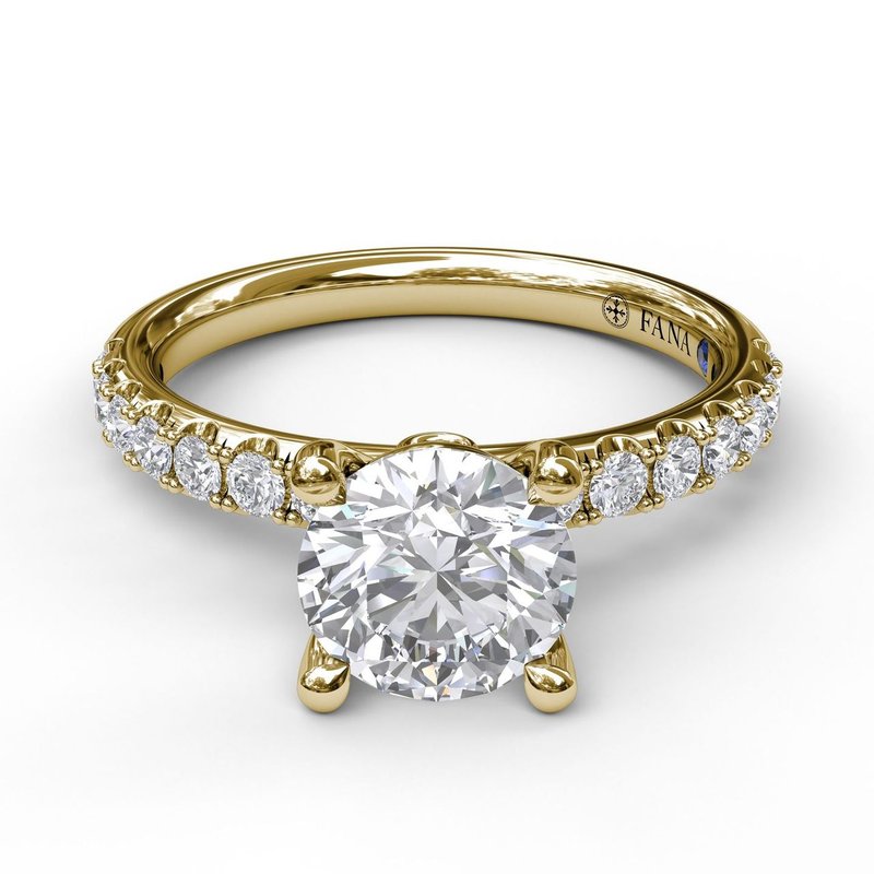 Yellow gold ring with round diamonds.