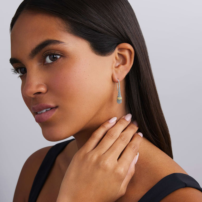 Sterling silver drop earrings with caviar design.
