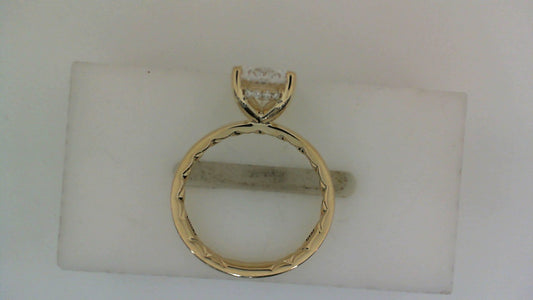 Yellow gold ring with hidden diamond accents.