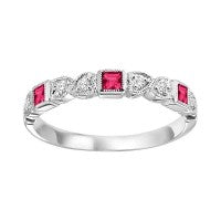 White gold band with princess rubies, diamonds.