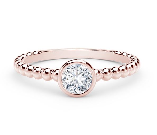 Rose gold ring with round diamond centerpiece.