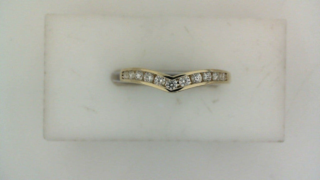 Contour yellow gold band with round diamonds.