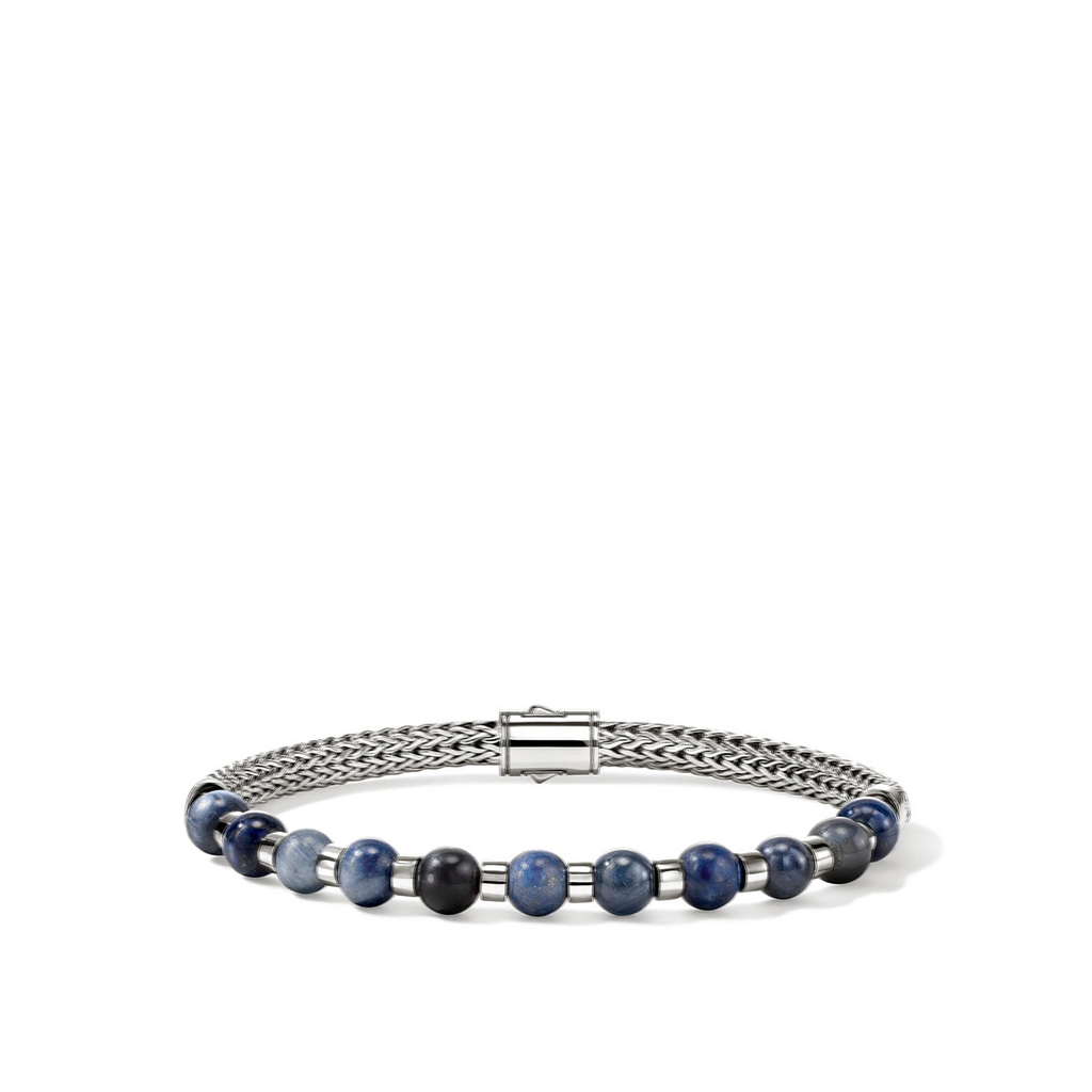 Sterling silver bracelet with blue gemstones.