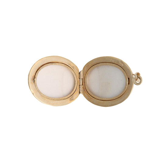 14K yellow gold oval locket, no stones.