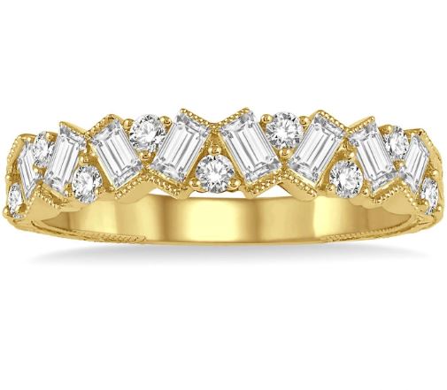 Yellow gold ring with baguette diamonds.