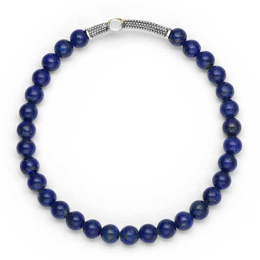 Blue lapis stretch bracelet with silver accents.