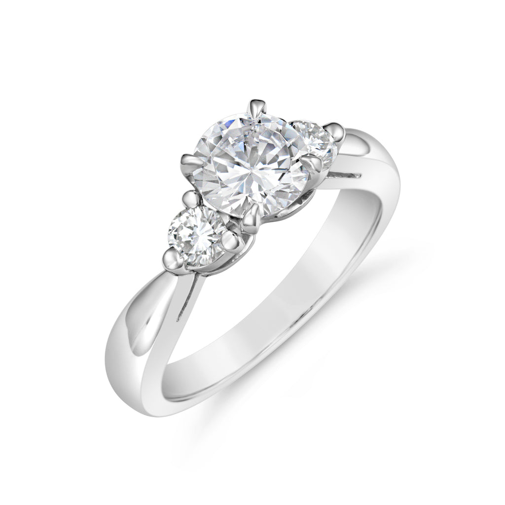 Platinum ring with three round diamonds.