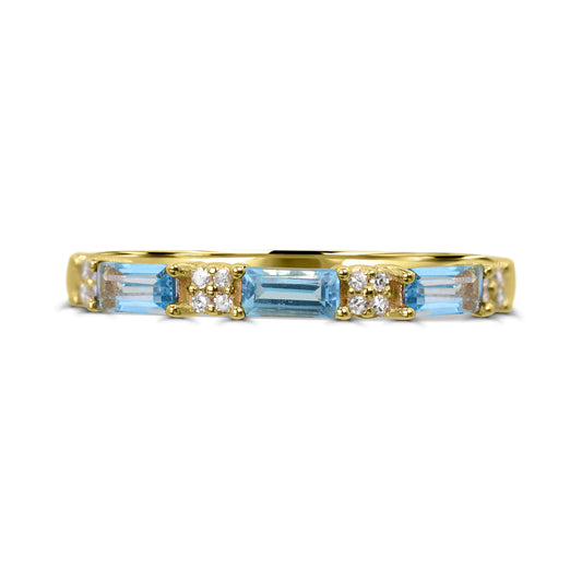 Yellow gold band with blue topazes, diamonds.