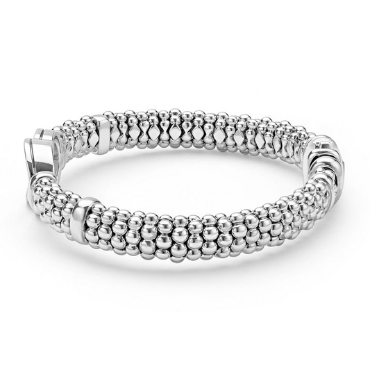 Sterling silver beaded diamond bracelet.