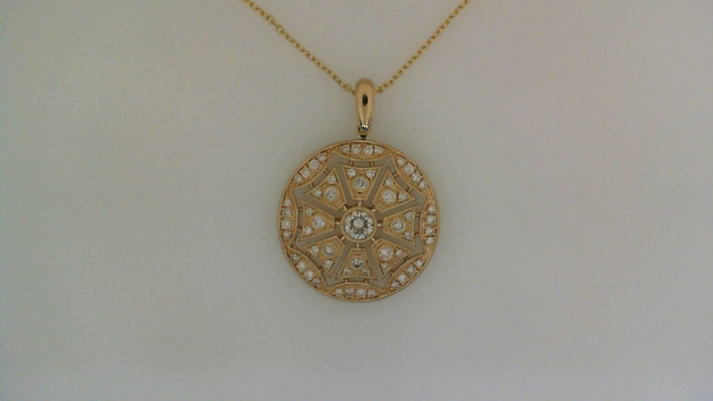 Round diamond pendant, yellow gold necklace.