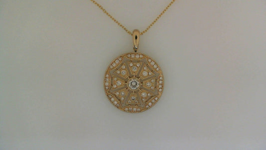 Round diamond pendant, yellow gold necklace.