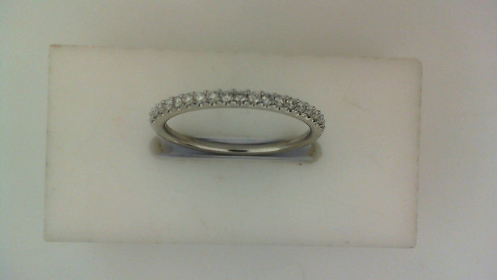 14K white gold band with round diamonds.