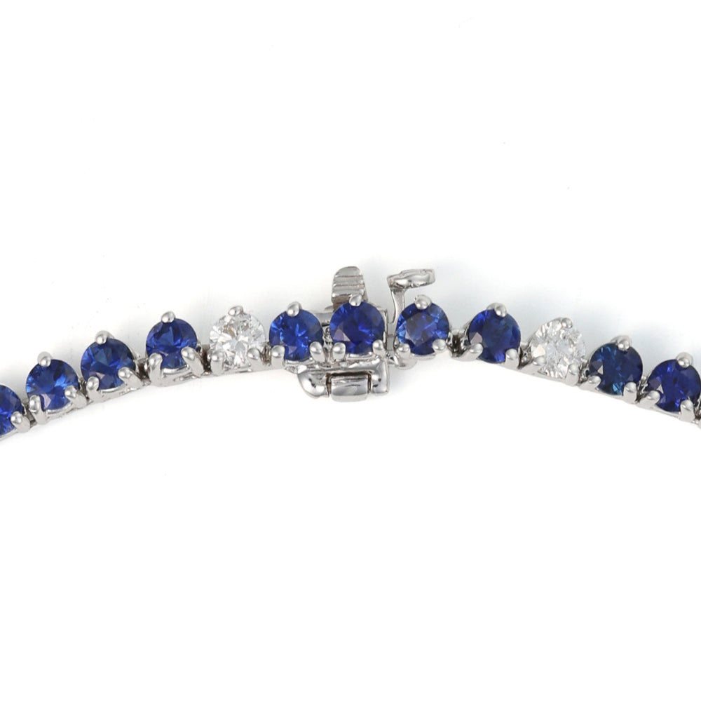 Blue sapphire and diamond necklace clasp.