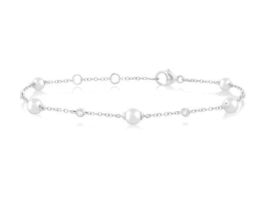 White gold bracelet with pearls and diamonds.