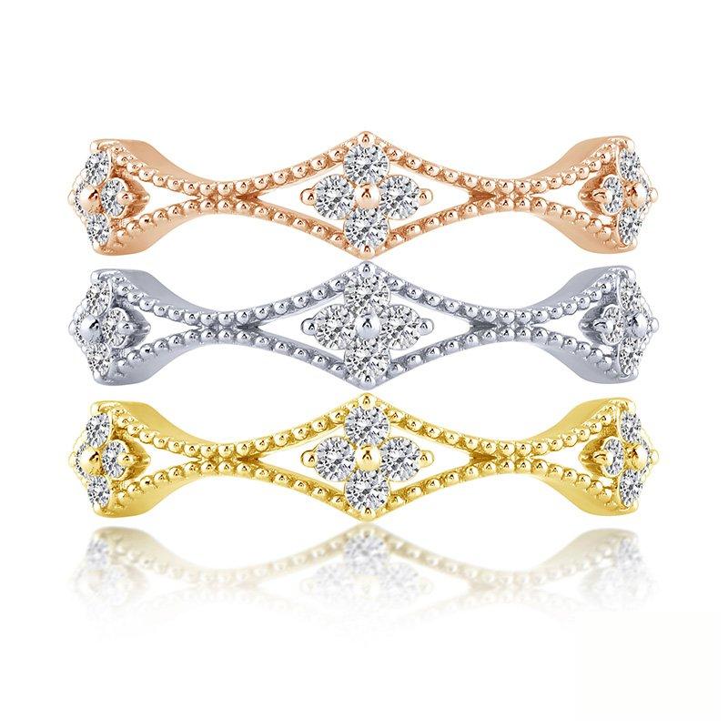 Three stackable diamond rings in gold.