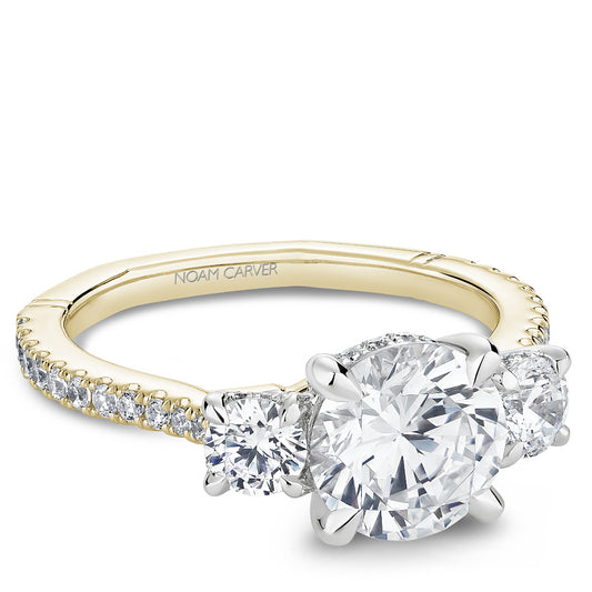 Three-stone diamond ring with accent stones.