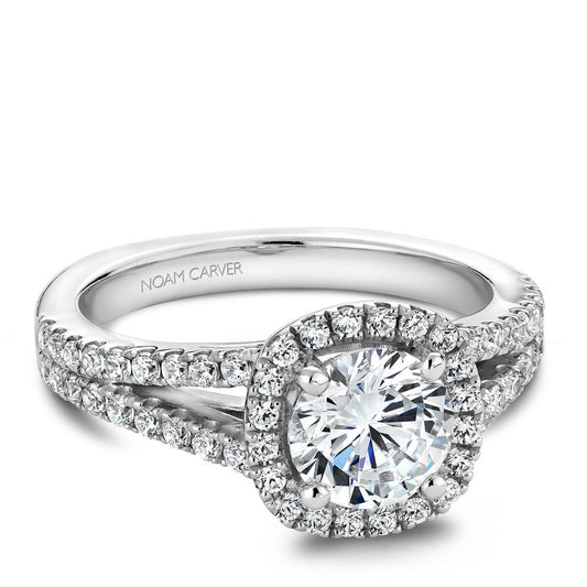 Halo diamond ring in white gold setting.