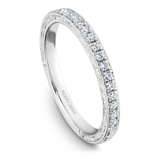 Vintage white gold band with round diamonds.