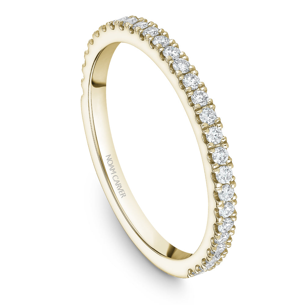 Yellow gold band with round diamonds.