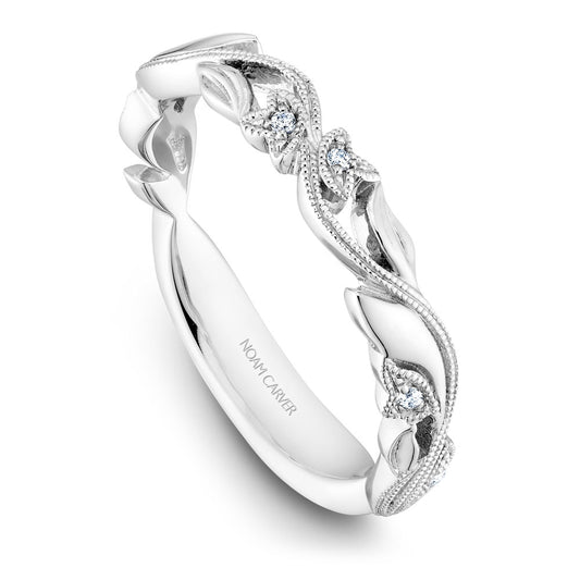 Intricate white gold band with diamonds.
