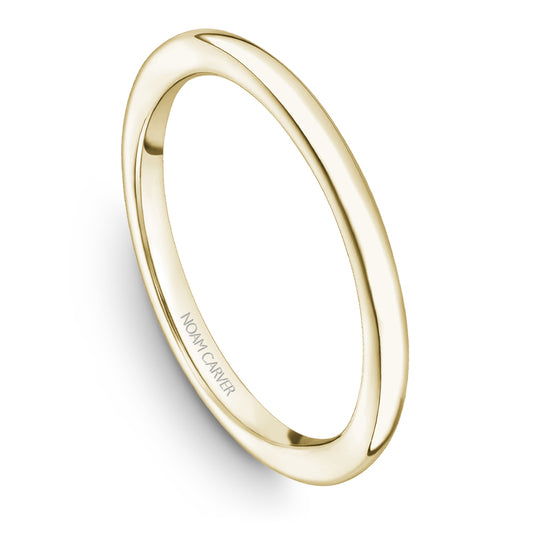 Polished yellow gold carved band ring.