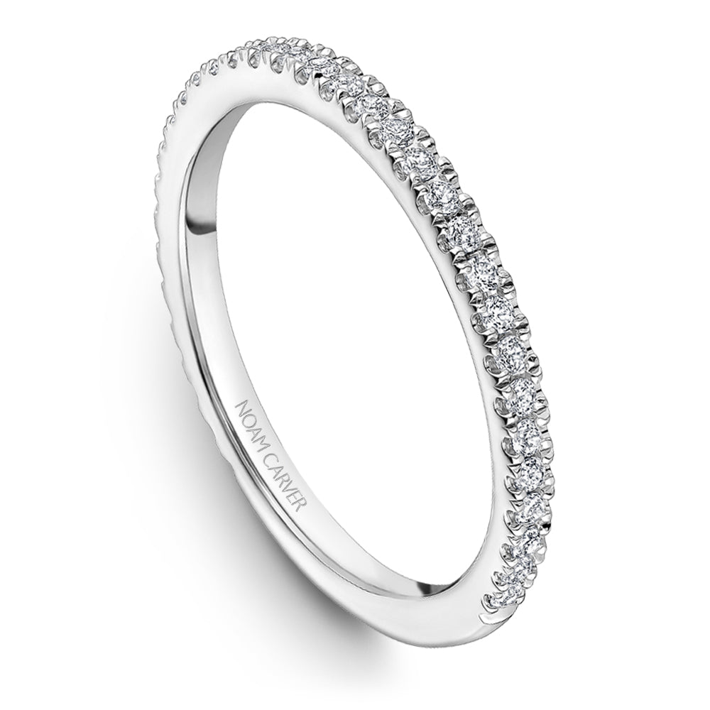 Diamond band with round stones in white gold.