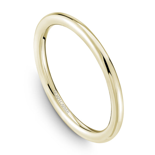 Polished yellow gold carved band ring.