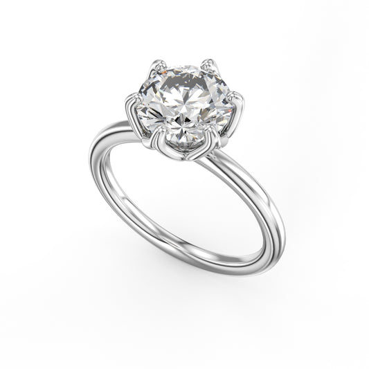 14K white gold solitaire diamond ring.