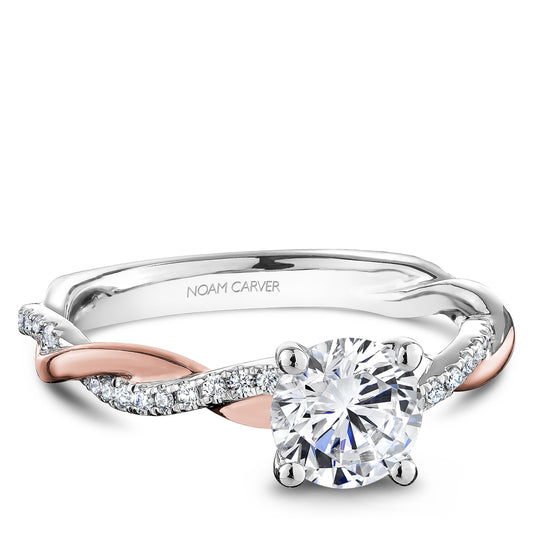 White and rose gold diamond-accented engagement ring.