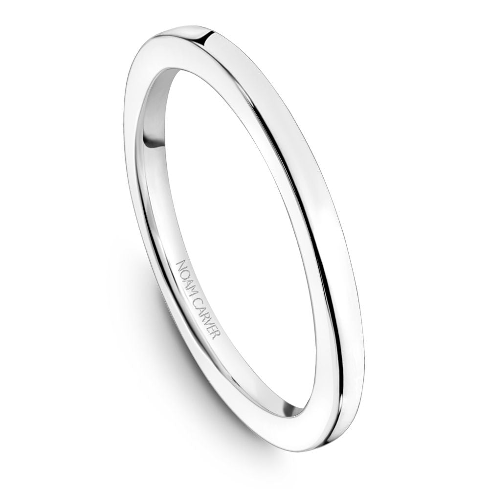 Polished 14K white gold carved band.