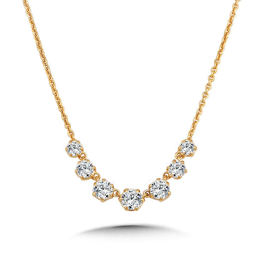 Seven-diamond yellow gold necklace.