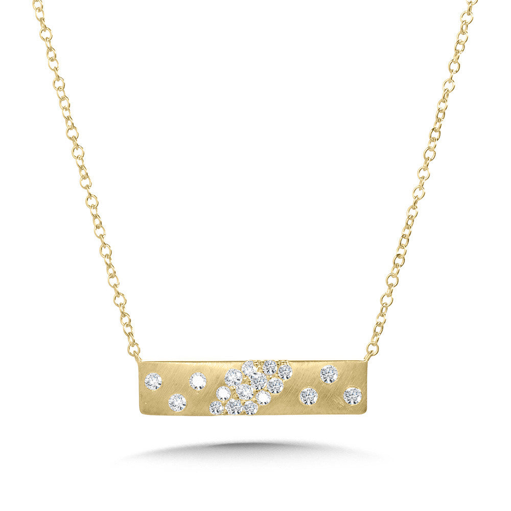 Yellow gold bar necklace with round diamonds.