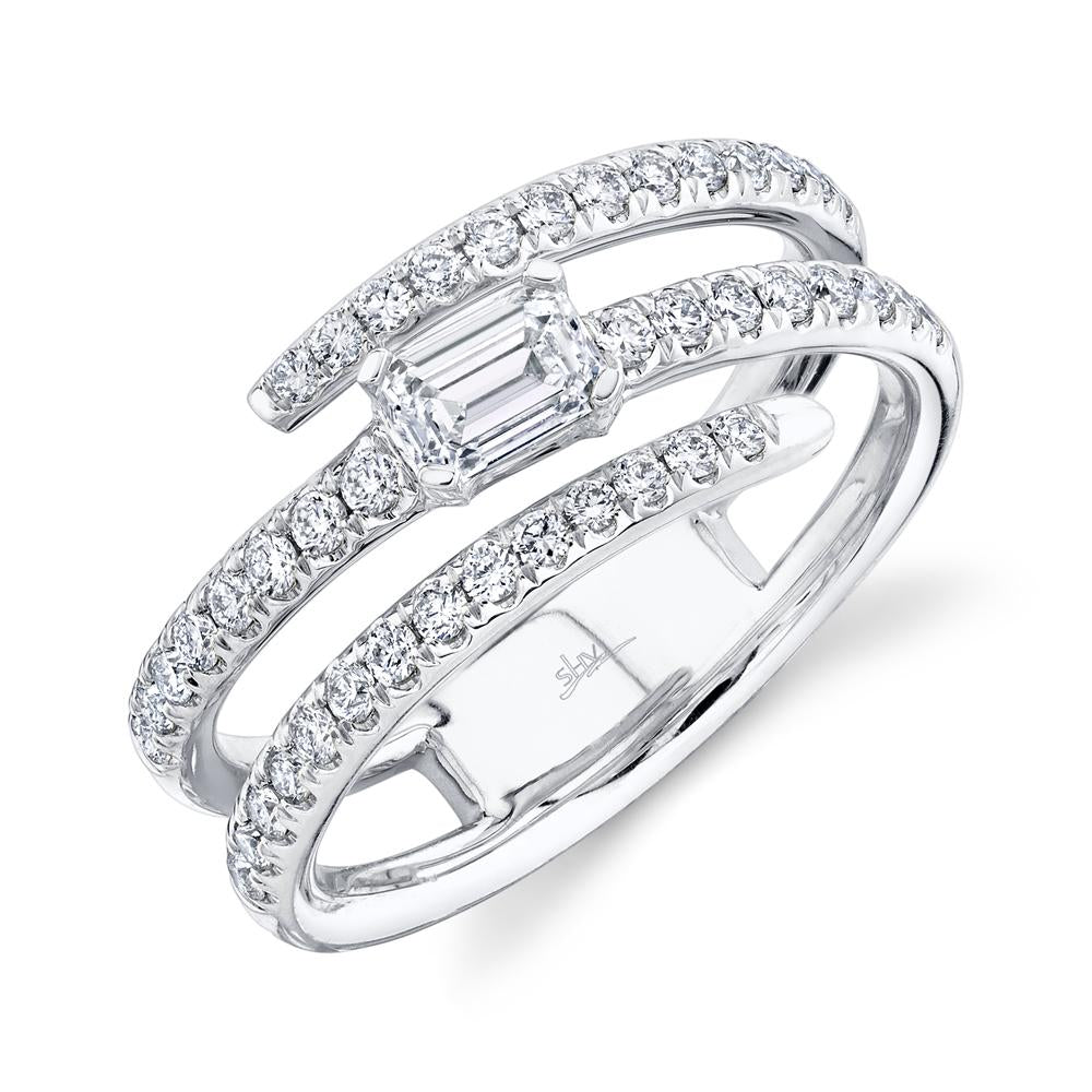 White gold ring with various diamond shapes.