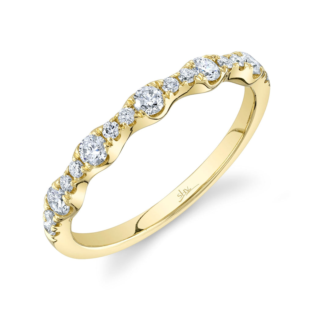 Yellow gold band with round diamonds.