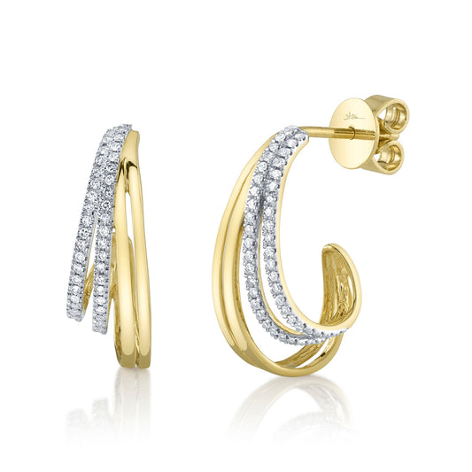Yellow gold J hoop diamond earrings.