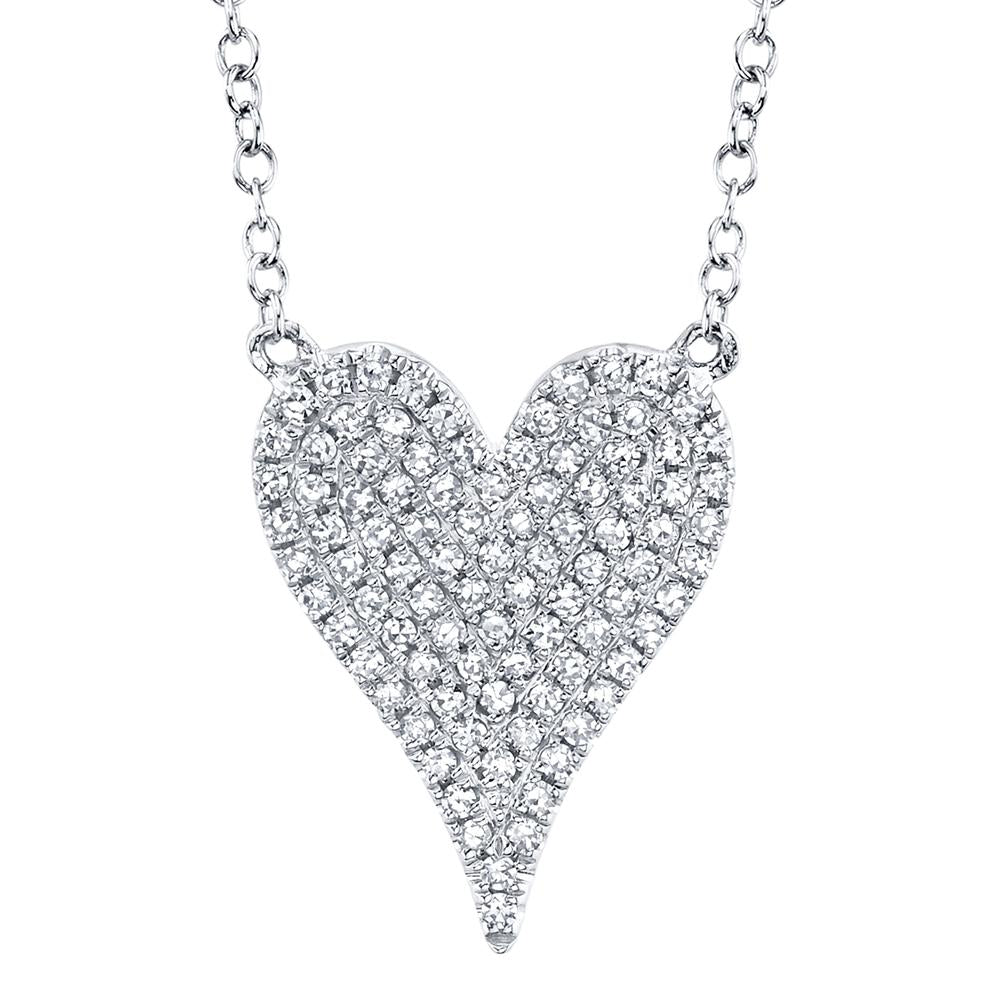 Heart-shaped diamond pendant necklace.