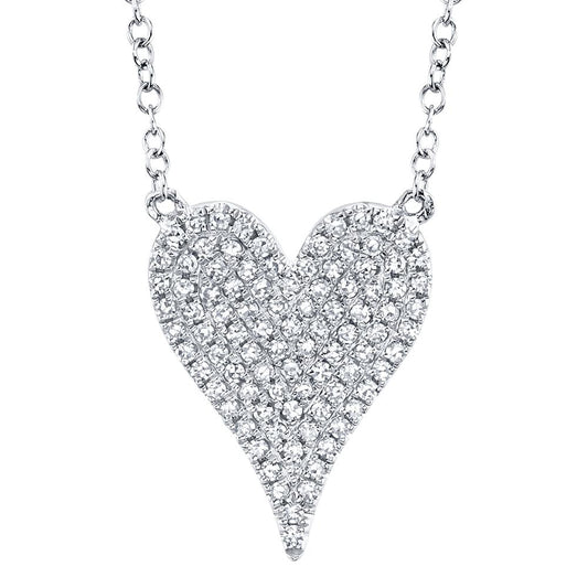 Heart-shaped diamond pendant necklace.