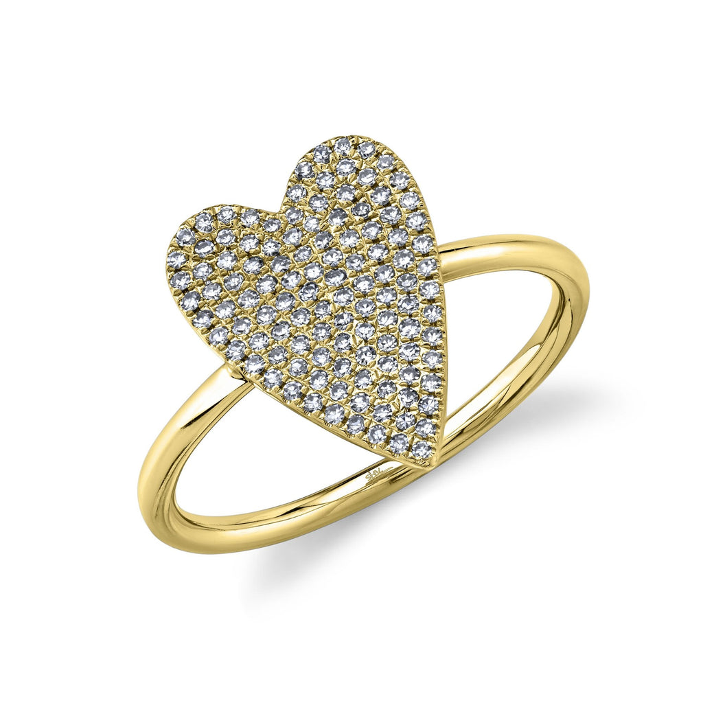 Heart-shaped diamond cluster on yellow gold band.