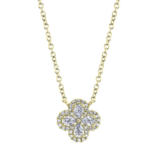 Clover-shaped diamond necklace in yellow gold.