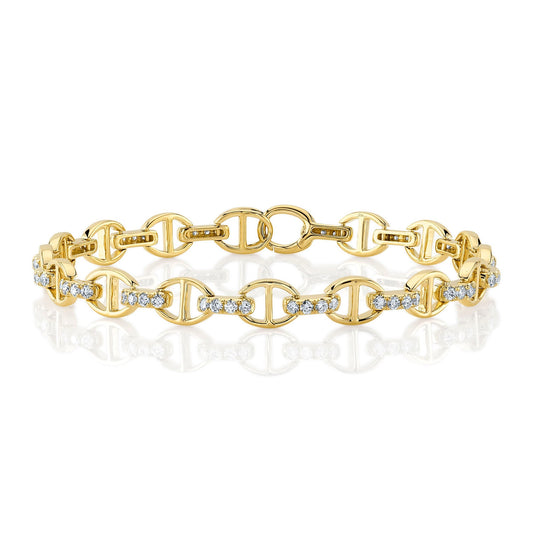 Yellow gold bracelet with diamond links.