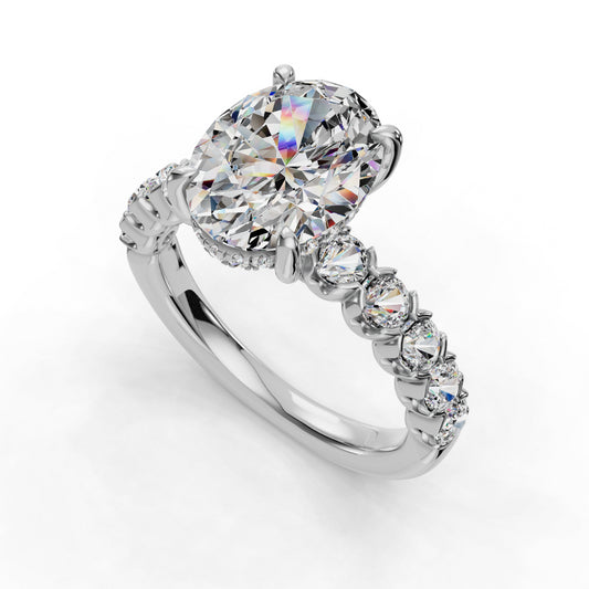 Oval diamond ring with round diamond band.
