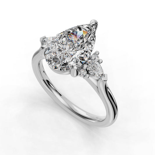 Pear-shaped diamond ring with side stones.