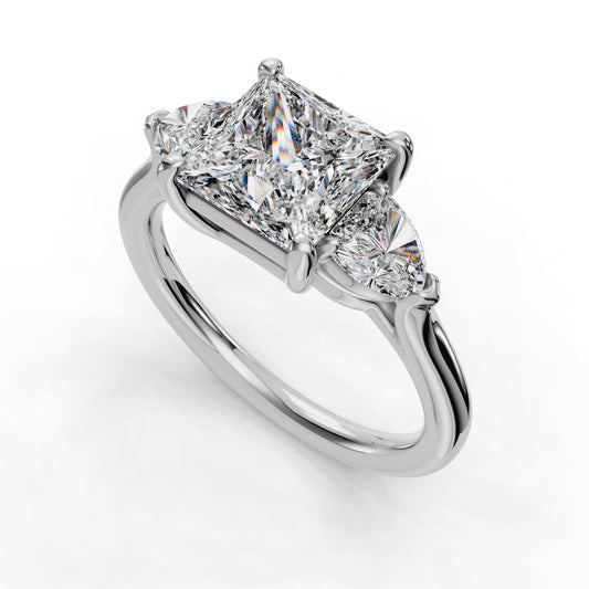 White gold ring with three sparkling diamonds.