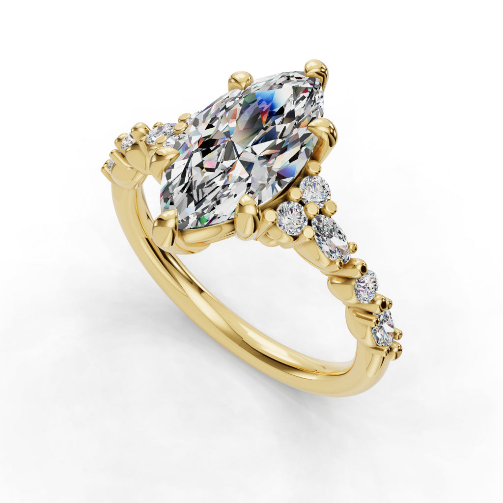 Gold ring with marquise diamond and side stones.