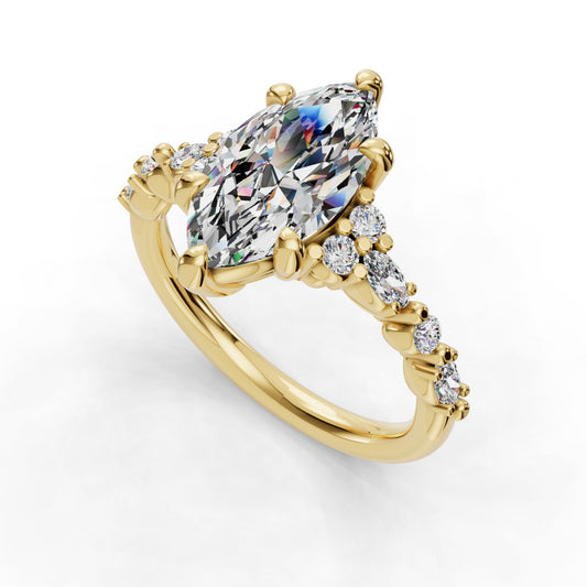 Gold ring with marquise diamond and side stones.
