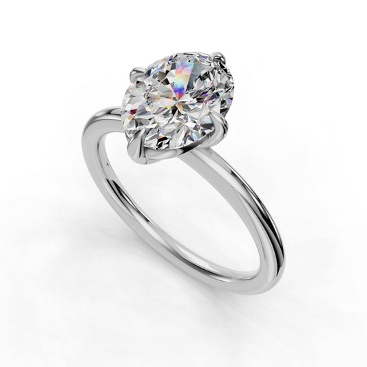 Solitaire diamond ring with sleek silver band.