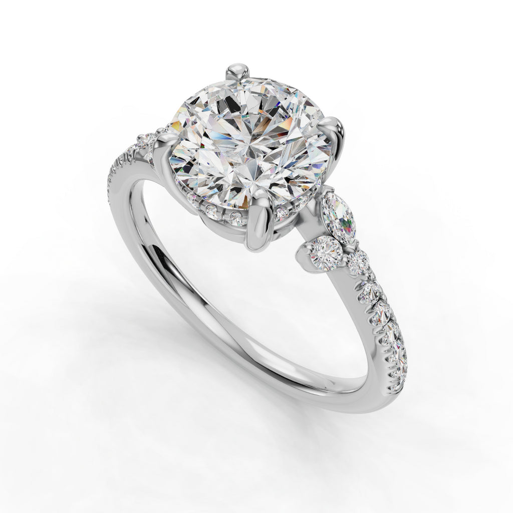 Round diamond ring with pavé band accents.