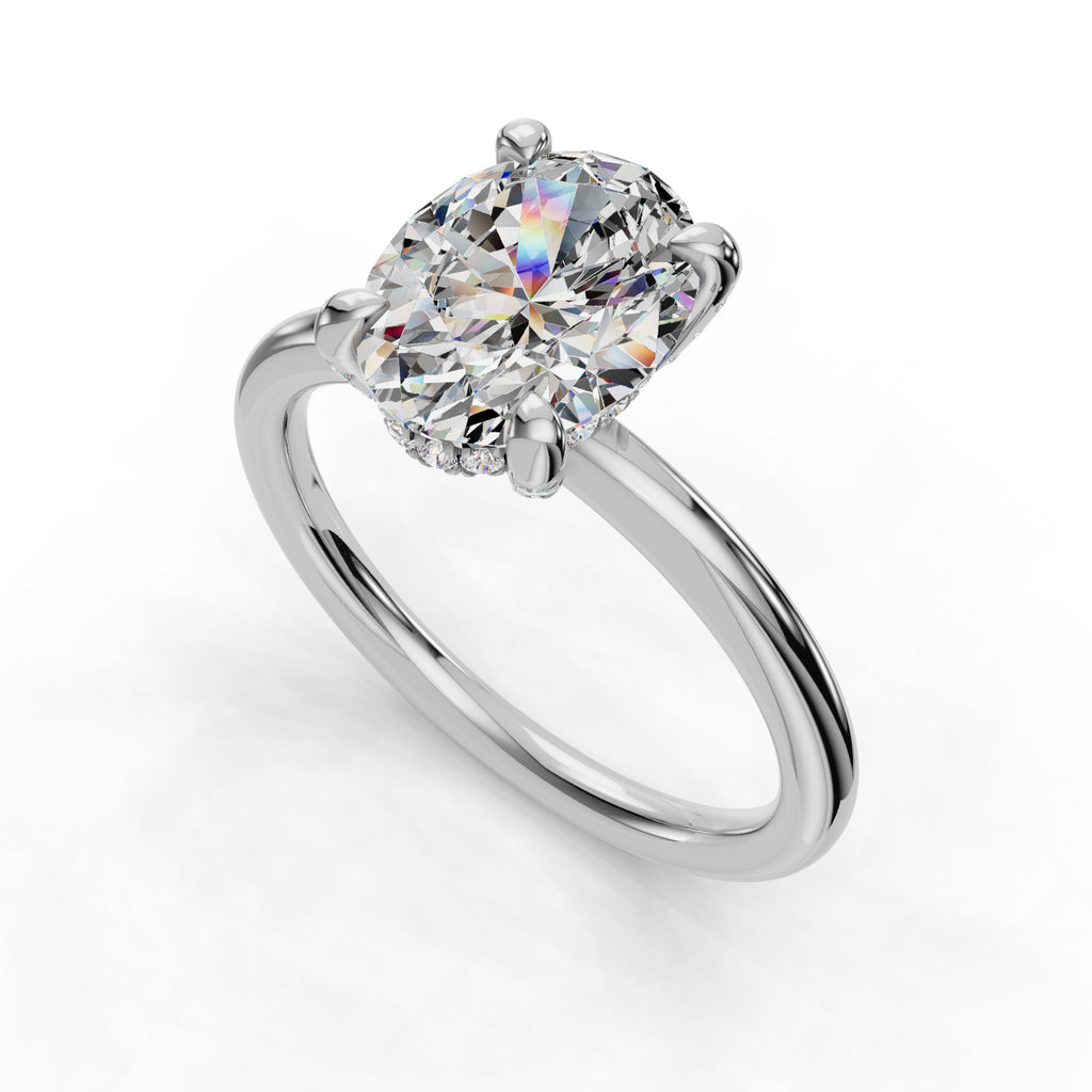 Oval diamond solitaire on sleek platinum band.