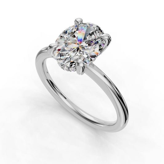 Oval diamond solitaire on sleek platinum band.